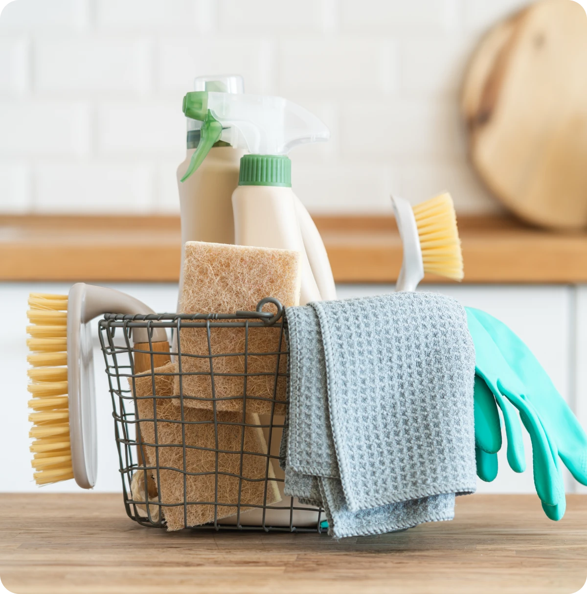 Cleaning essentials on a kitchen counter