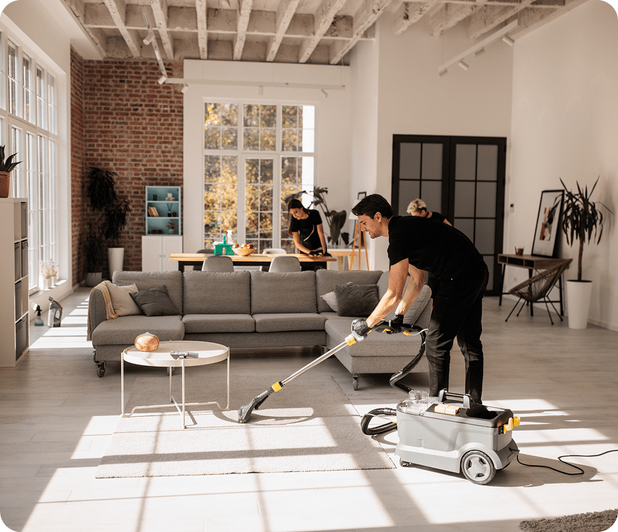 Sunlit room being cleaned